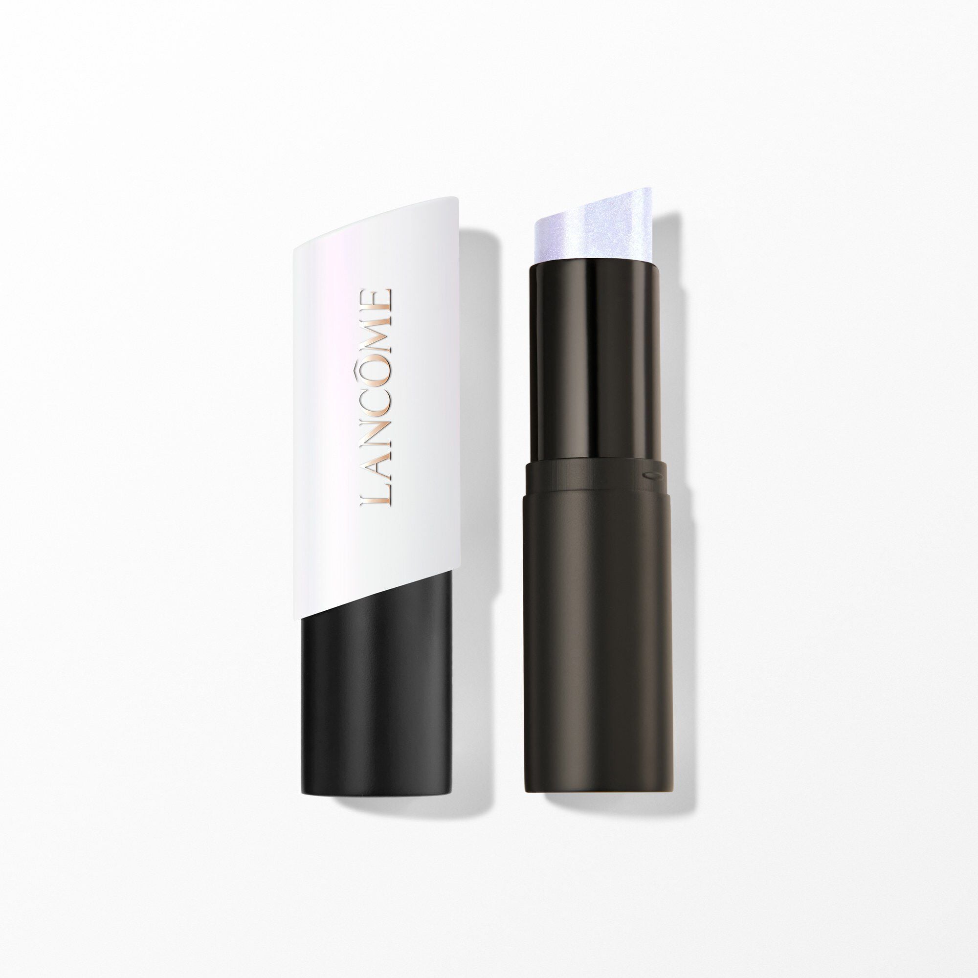 Teint Idole Shape Stick Highlighter with an open cap.
