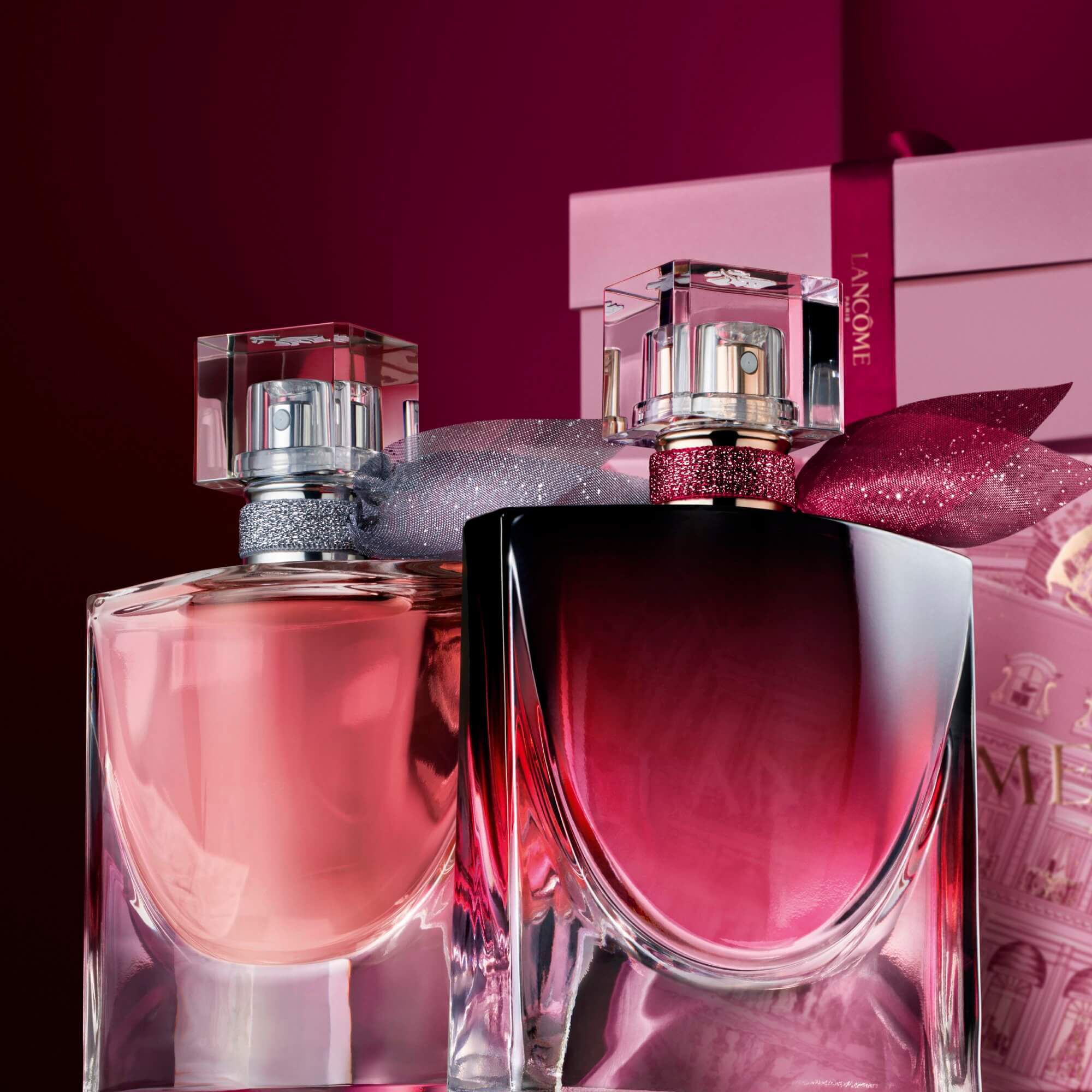 Image of La vie est belle EDP and La vie est belle L'Elixir Very Cherry standing in front of a pile of pink and dark red gift boxes, set against a dark red background. Image of La vie est belle EDP and La vie est belle L'Elixir Very Cherry standing in front of a pile of pink and dark red gift boxes, set against a dark red background. Image of La vie est belle EDP and La vie est belle L'Elixir Very Cherry standing in front of a pile of pink and dark red gift boxes, set against a dark red background. Image of La vie est belle EDP and La vie est belle L'Elixir Very Cherry standing in front of a pile of pink and dark red gift boxes, set against a dark red background. Image of La vie est belle EDP and La vie est belle L'Elixir Very Cherry standing in front of a pile of pink and dark red gift boxes, set against a dark red background. Image of La vie est belle EDP and La vie est belle L'Elixir Very Cherry standing in front of a pile of pink and dark red gift boxes, set against a dark red background. Image of La vie est belle EDP and La vie est belle L'Elixir Very Cherry standing in front of a pile of pink and dark red gift boxes, set against a dark red background. 