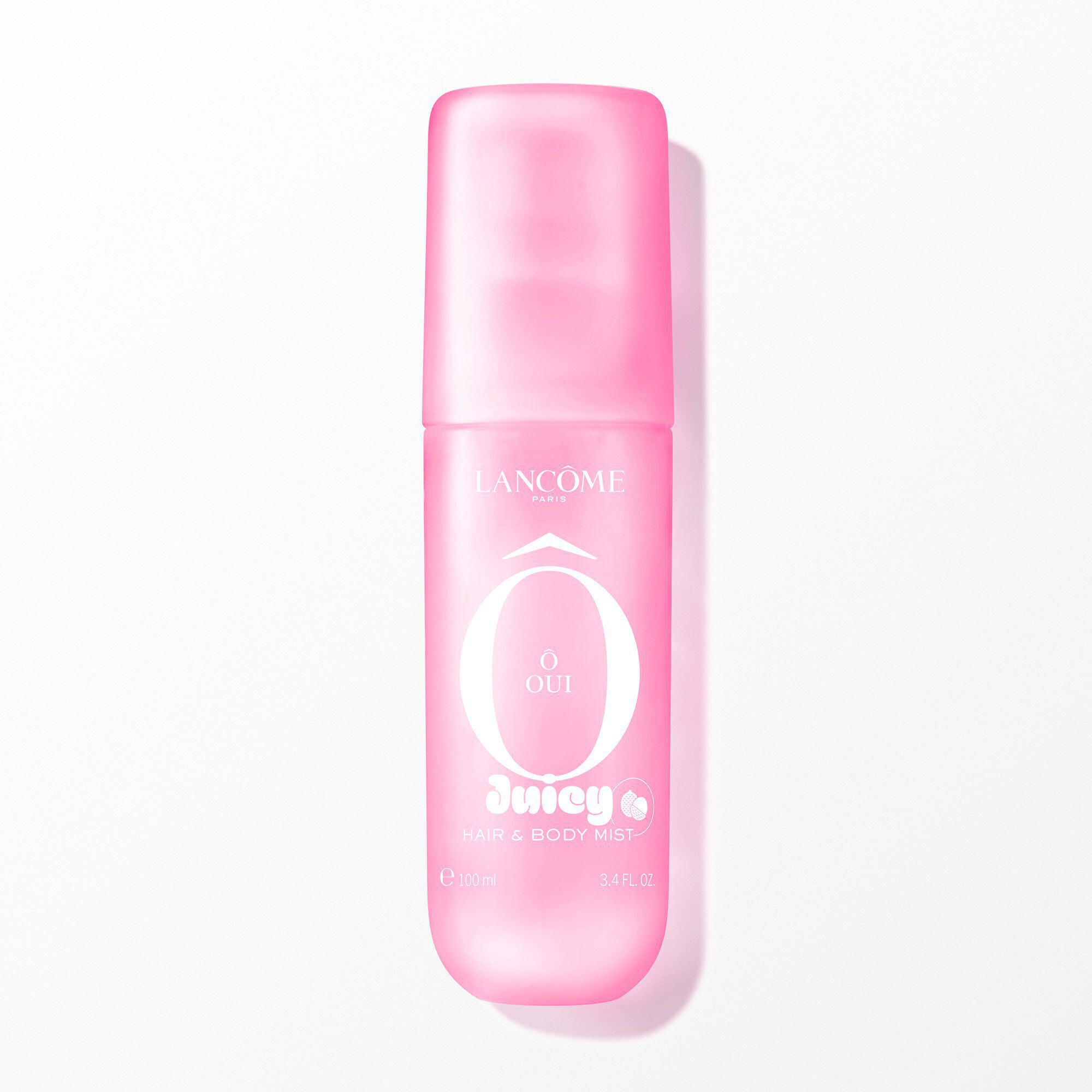A bright pink spray bottle of Lancome O OUI Juicy Hair & Body Mist.