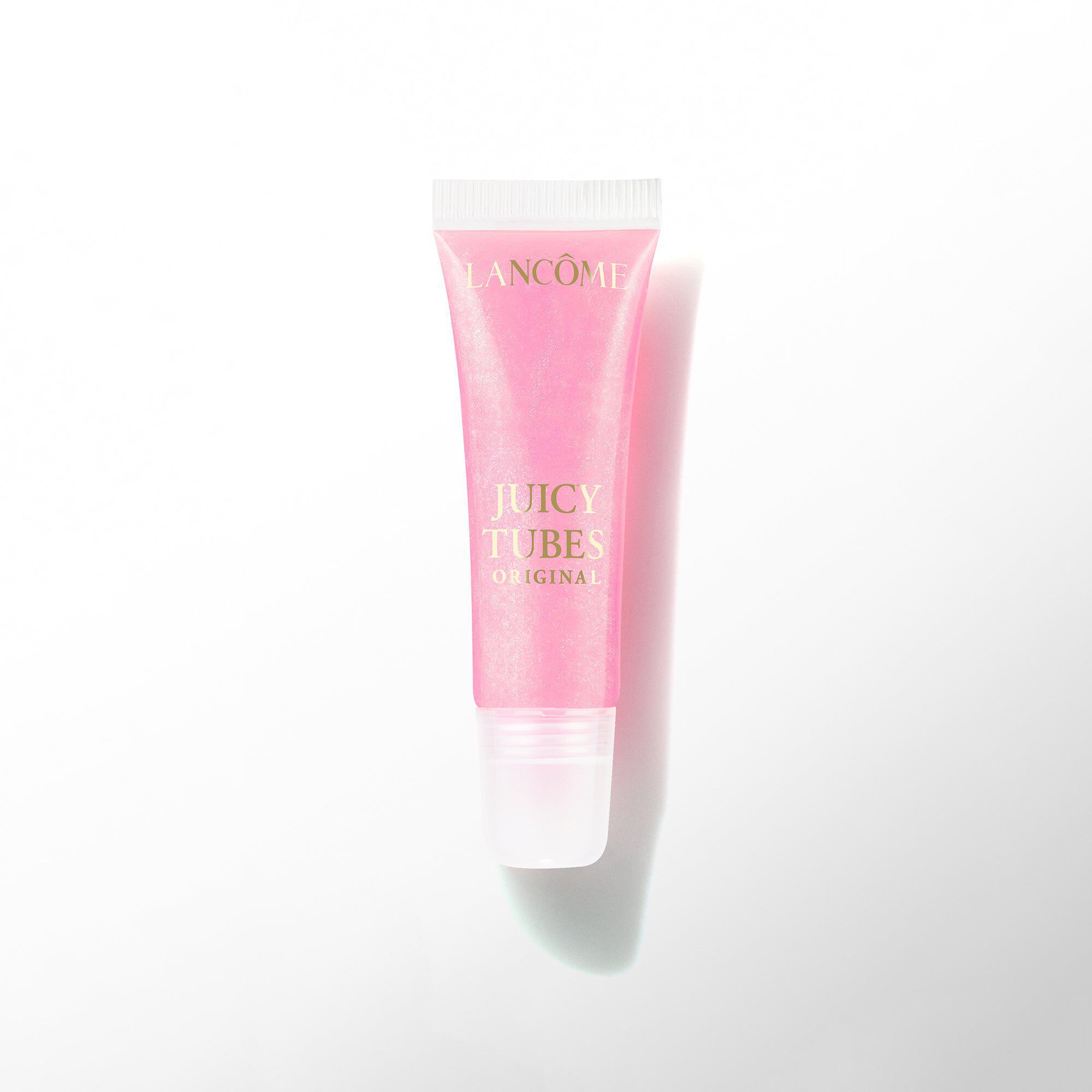 A tube of Lancome Juicy Tubes Original lip gloss in a bright pink shade.