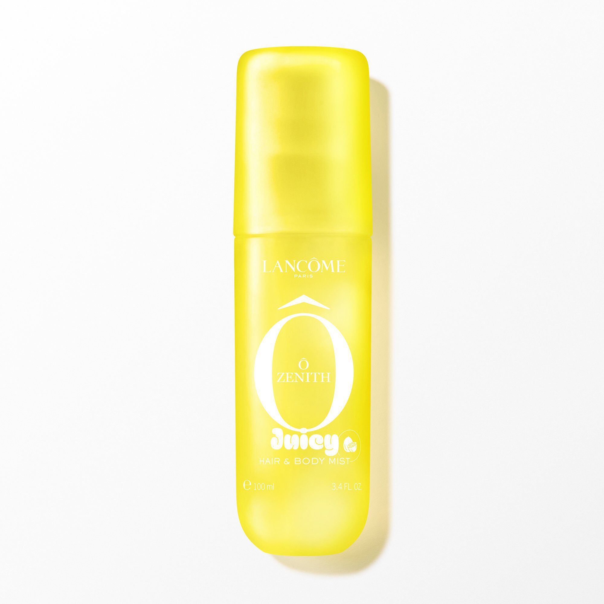A bright yellow spray bottle of Lancome O ZENITH Juicy Hair & Body Mist.